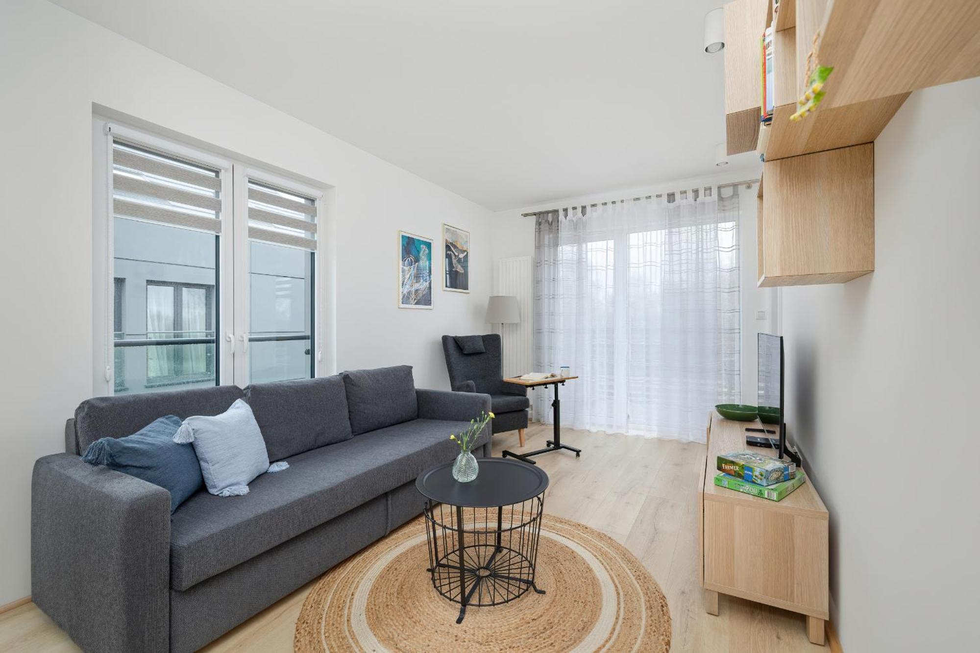 Apartment Cosy And Bright In With Furnished Balcony And Free Parking By Renters Dzwirzyno